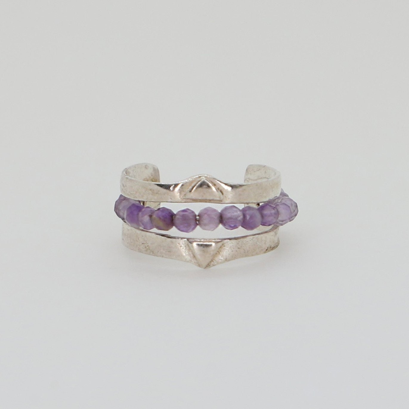 Piercing Universo com pedras
